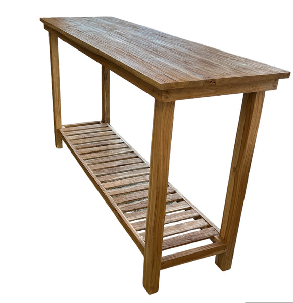 A natural raw teak wood console table with a bottom shelf, featuring a slatted design, side view