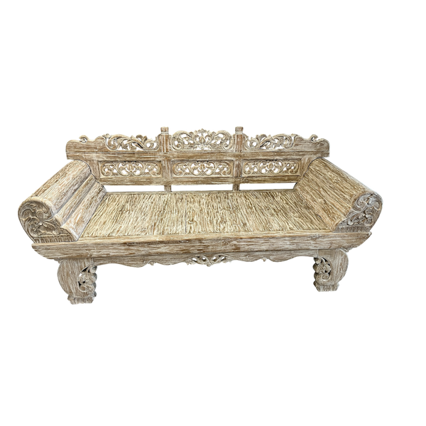 Decorative wooden white washed teak day bed with intricate carvings, front view